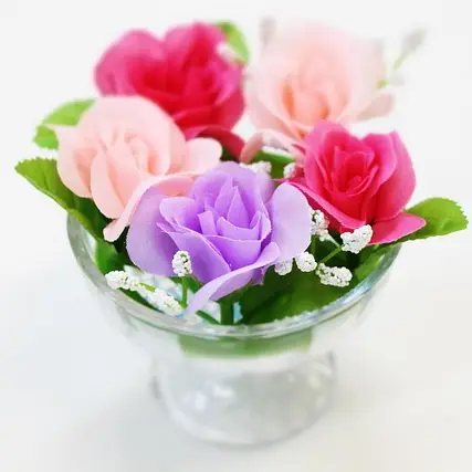 flores preservadas y artificiales